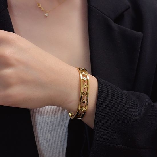 Louis Vuitton LV Engraved Hollow Four Leaf Clover Bangle
