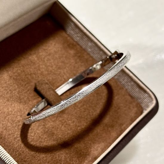 Piaget Brushed Carved Smooth Silver Bangle