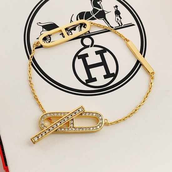 Hermes Oval Diamond Inlaid Gold Bracelet