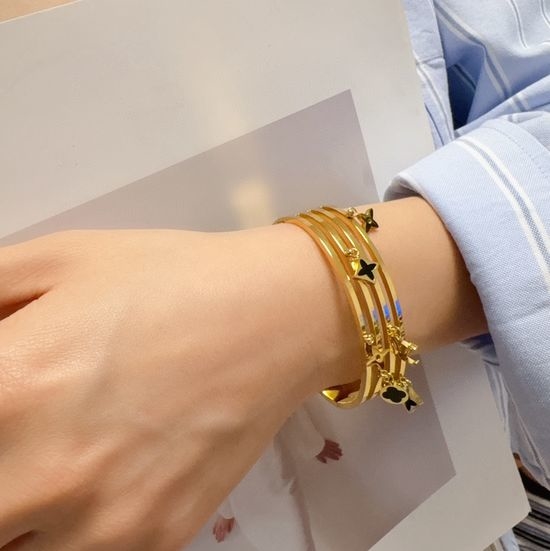 Louis Vuitton LV Hollow Carved 14K Gold Plated Bracelet