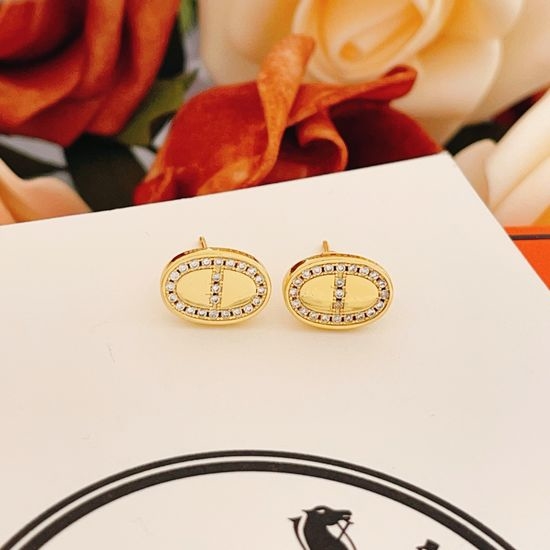 Hermes Gold Stud Earrings Brass Material