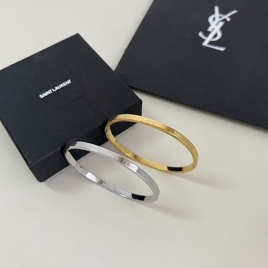 Yves Saint Laurent YSL Elegant Abstract Brass Bracelet