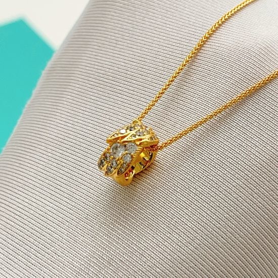 Tiffany & Co. Gold Wing Pendant Necklace Delicate Design
