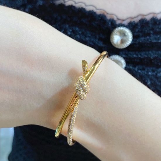 Tiffany & Co. Half Diamond Knot Design V Gold Bangle