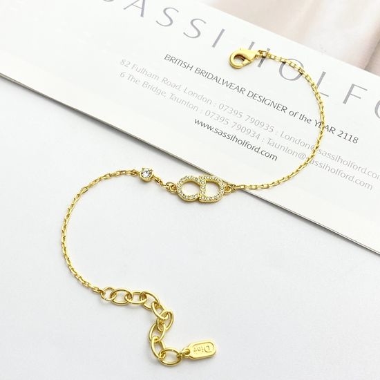 Christian Dior CD Rhinestone Inlaid Gold Tone Bracelet